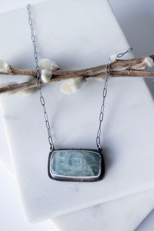 River Gods Necklace with Aquamarine and Salmon Silhouette
